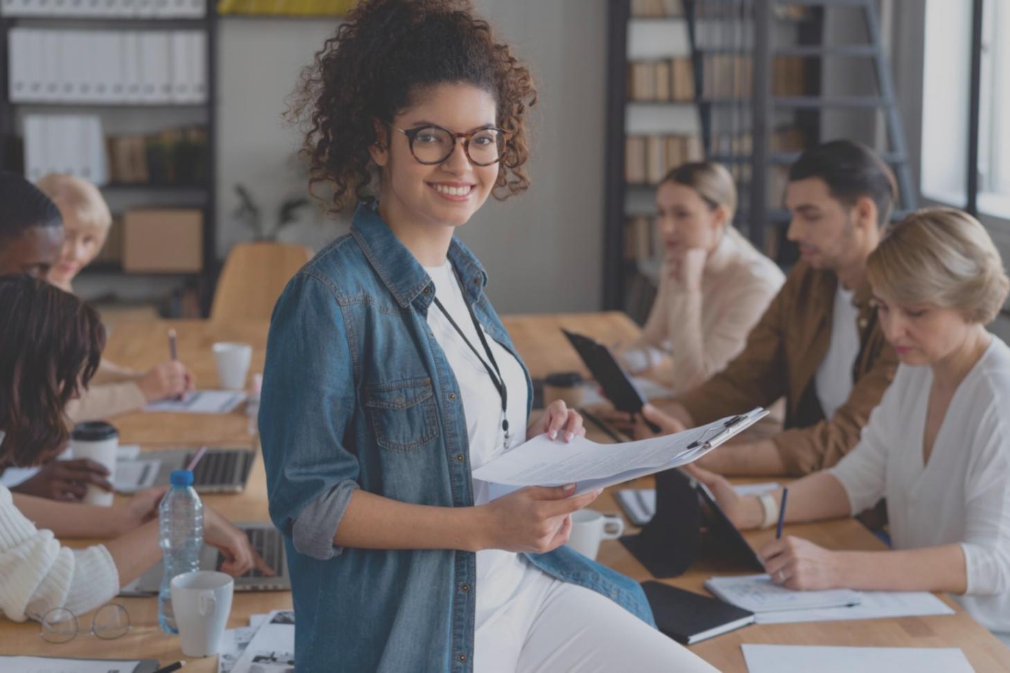 Budget analysis meeting with team reviewing variance reports